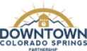 A logo with two elephants facing each other under a stylized sun.